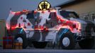 German Bundeswehr army Dingo armoured vehicle, which is decorated as an Advent calendar, is seen illuminated with Christmas lights in an army camp in Kunduz, northern Afghanistan, December 3, 2012. REUTERS/Fabrizio Bensch (AFGHANISTAN - Tags: MILITARY CONFLICT) Published: Pro. 3, 2012, 2:42 odp.