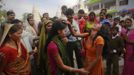 A devotee who is believed to be possessed by evil spirits cries in a state of trance while being confronted by her relatives at Guru Deoji Maharaj temple during a ghost fair at Malajpur village in Betul district in the central Indian state of Madhya Pradesh January 27, 2013. People from across India come to this fair to be exorcised of �evil spirits�. They are usually brought by relatives and they are most often women. The exorcism involves running around the temple courtyard to make the 'ghost' weak then being beaten by a priest with a broom. Picture taken January 27, 2013. REUTERS/Danish Siddiqui (INDIA - Tags: SOCIETY RELIGION) ATTENTION EDITORS: PICTURE 12 OF 24 FOR PACKAGE 'INDIAN GHOSTBUSTERS' SEARCH 'INDIA GHOST' FOR ALL IMAGES Published: Úno. 5, 2013, 5:09 dop.