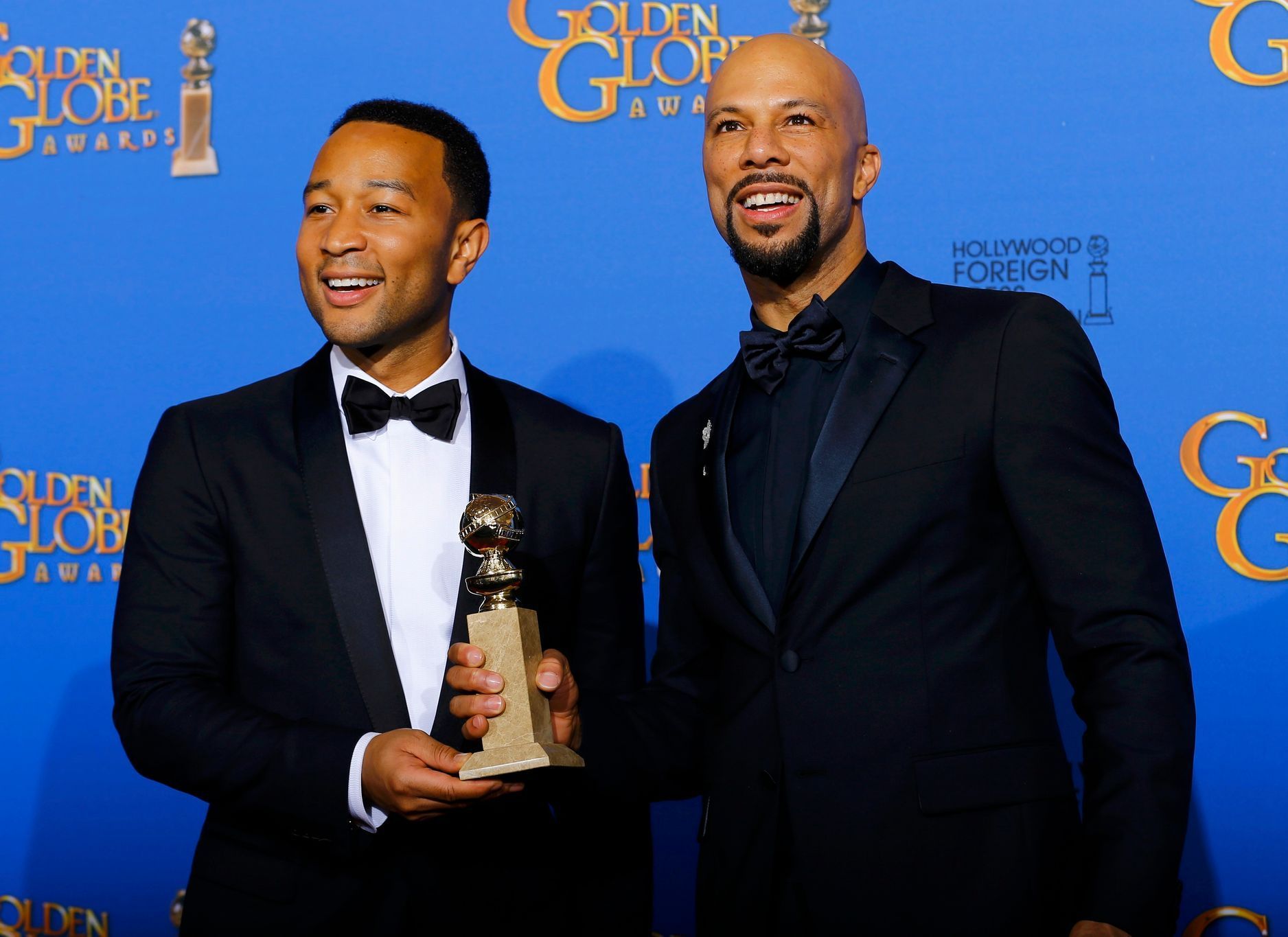 Singer Legend and rap artist Common pose backstage after they won the award for Best Original Song - Motion Picture for the song &quot;Glory&quot; from the film &quot;Selma&quot; at the 72nd Golden Gl