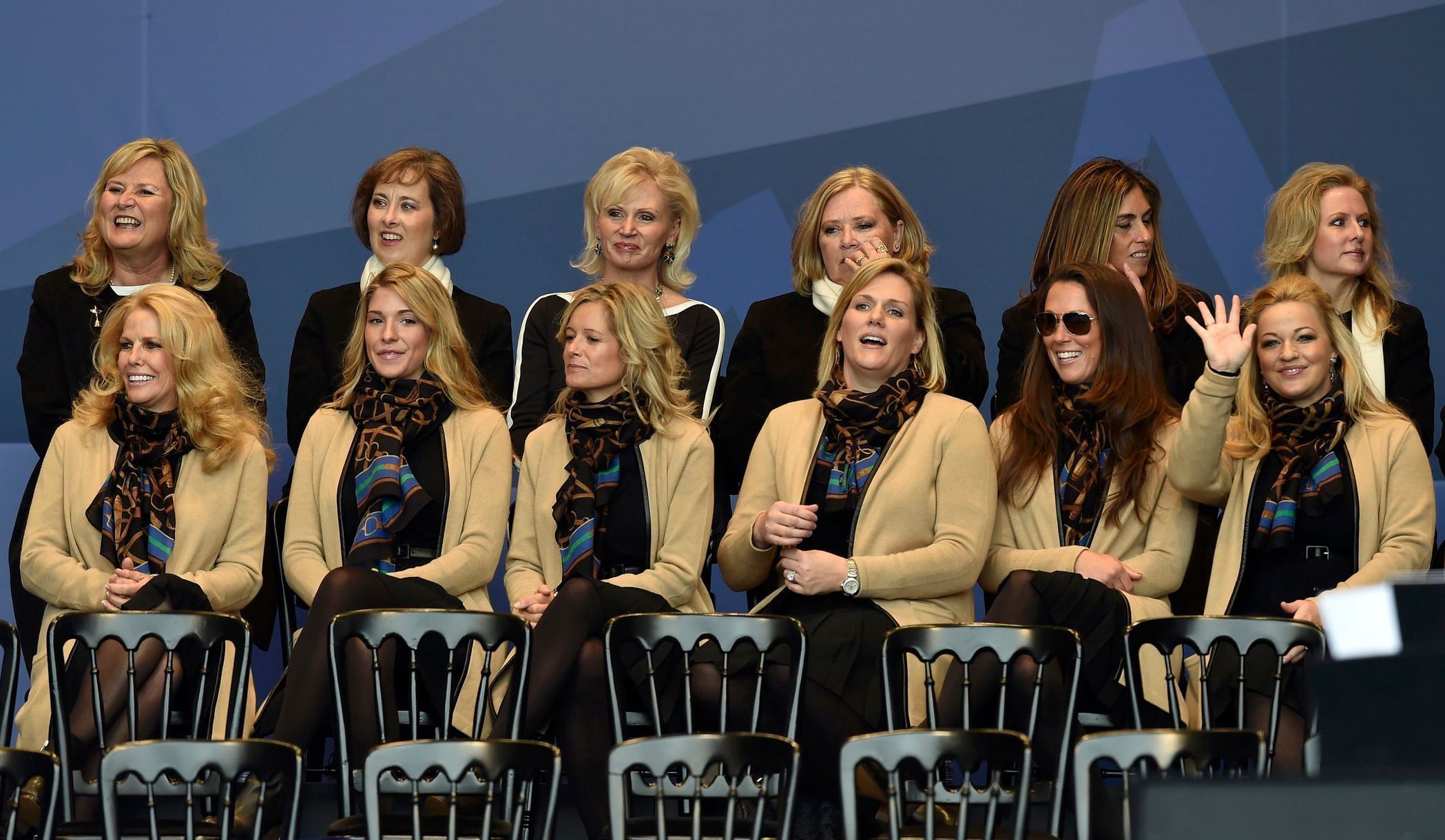 The wives and partners of the U.S. Team watch during the opening ceremony of the 40th Ryder Cup at Gleneagles