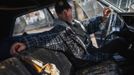 Ronny Kmiotek, a retired New York City Police Officer, poses for a photograph behind the wheel of his 1965 Chevrolet Impala which was found seven blocks from his home after Hurricane Sandy slammed into New Dorp Beach, Staten Island November 14, 2012. Kmiotek, like so many others around him, lost virtually everything to the flood waters. "This storm or after it, just brought everyone here together and I am really thankful for all the help we are getting from people." Picture taken November 14, 2012. REUTERS/Mike Segar (UNITED STATES - Tags: DISASTER ENVIRONMENT) ATTENTION EDITORS PICTURE 05 OF 19 FOR PACKAGE 'SURVIVING SANDY' SEARCH 'SEGAR SANDY' FOR ALL PICTURES Published: Lis. 20, 2012, 3:30 odp.