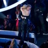 Miley Cyrus hugs her spokesperson Jesse after he accepted the award for video of the year for &quot;Wrecking Ball&quot; on stage during the 2014 MTV Video Music Awards in Inglewood