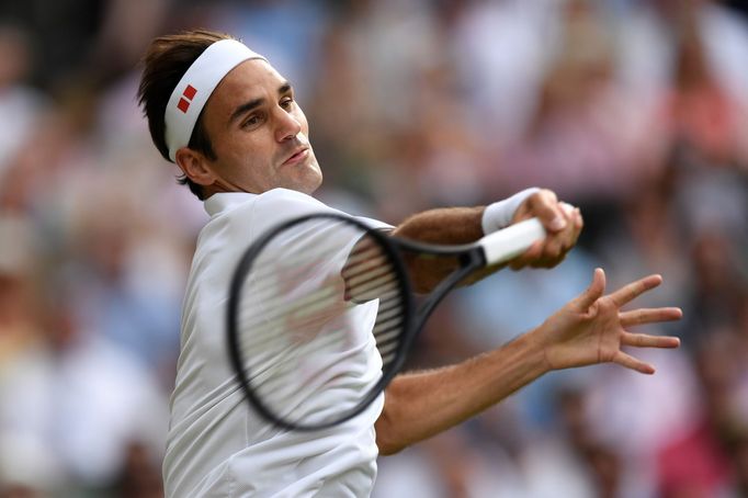 Tennis - Wimbledon - All England Lawn Tennis and Croquet Club, London, Britain - July 10, 2019  Switzerland's Roger Federer in action during his quarter final match again