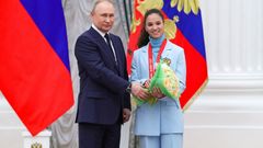 Russian President Vladimir Putin attends a meeting with gold medallists of the 2022 Beijing Olympics in Moscow