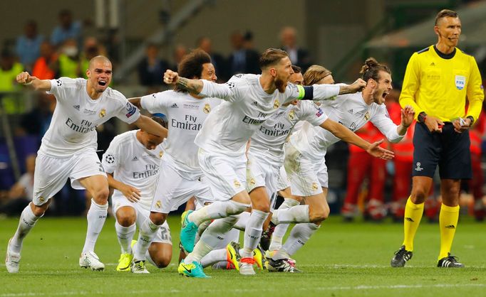 Real Madrid celebrate winning the penalty shootout and the UEFA Champions League Final