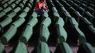 A Bosnian Muslim girl touches the coffin of her relative which was prepared for a mass burial at the Memorial Center in Potocari, near Srebrenica July 9, 2012. The bodies of 520 recently identified victims of the Srebrenica massacre will be buried on July 11, the anniversary of the massacre when Bosnian Serb forces commanded by Ratko Mladic slaughtered 8,000 Muslim men and boys and buried them in mass graves, in Europe's worst massacre since World War Two. REUTERS/Dado Ruvic (BOSNIA - Tags: POLITICS CONFLICT ANNIVERSARY TPX IMAGES OF THE DAY) Published: Čec. 9, 2012, 6:38 odp.