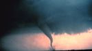 Tornado with dust and debris cloud forming at surface. During "Sound Chase", a joint project of NSSL and Mississippi State University. Oklahoma, Cordell. May 22, 1981. Credit: NOAA Photo Library, NOAA Central Library; OAR/ERL/National Severe Storms Laboratory (NSSL).