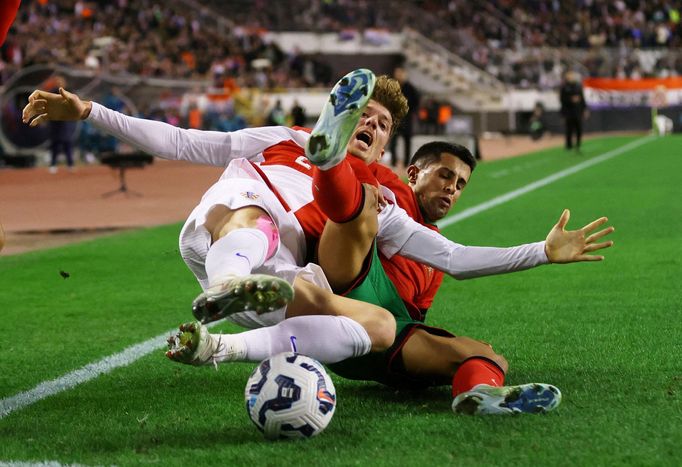 Soccer Football - Nations League - Group Stage - Croatia v Portugal - Poljud Stadium, Split, Croatia  - November 18, 2024 Croatia's Kristijan Jakic in action with Portuga