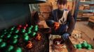 An employee paints a glass sphere for Christmas and New Year decorations, at the "Biryusinka" toy factory in Russia's Siberian city of Krasnoyarsk November 27, 2012. The factory, founded in 1942, produces decorative glass spheres, which can be found on Christmas trees all over the country and in Moscow's Kremlin in particular, during the festive season. REUTERS/Ilya Naymushin (RUSSIA - Tags: SOCIETY) Published: Lis. 27, 2012, 3:53 odp.