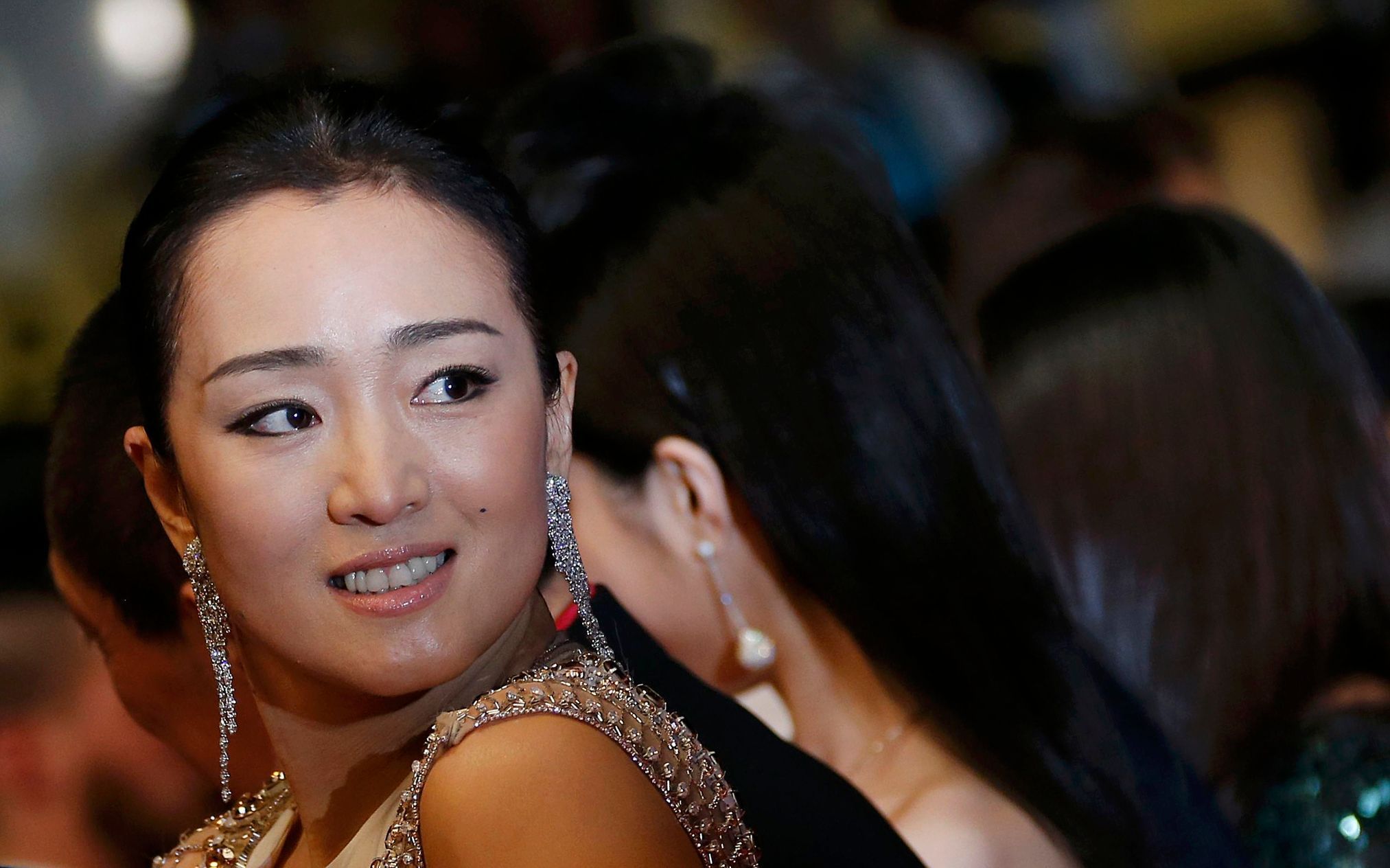 Cast member Gong Li poses on the red carpet as she arrives for the screening of the film &quot;Coming Home&quot; out of competition at the 67th Cannes Film Festival in Cannes