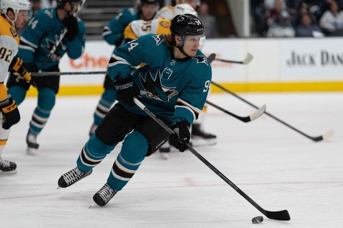 Mar 5, 2022; San Jose, California, USA;  San Jose Sharks left wing Alexander Barabanov (94) controls the puck during the first period against the Nashville Predators at S