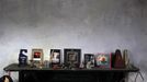 Objects rest above the fireplace of artist and poet Barry Edgar Pilcher's cottage on the Island of Inishfree in County Donegal, Ireland, May 1, 2012. REUTERS/Cathal McNaughton