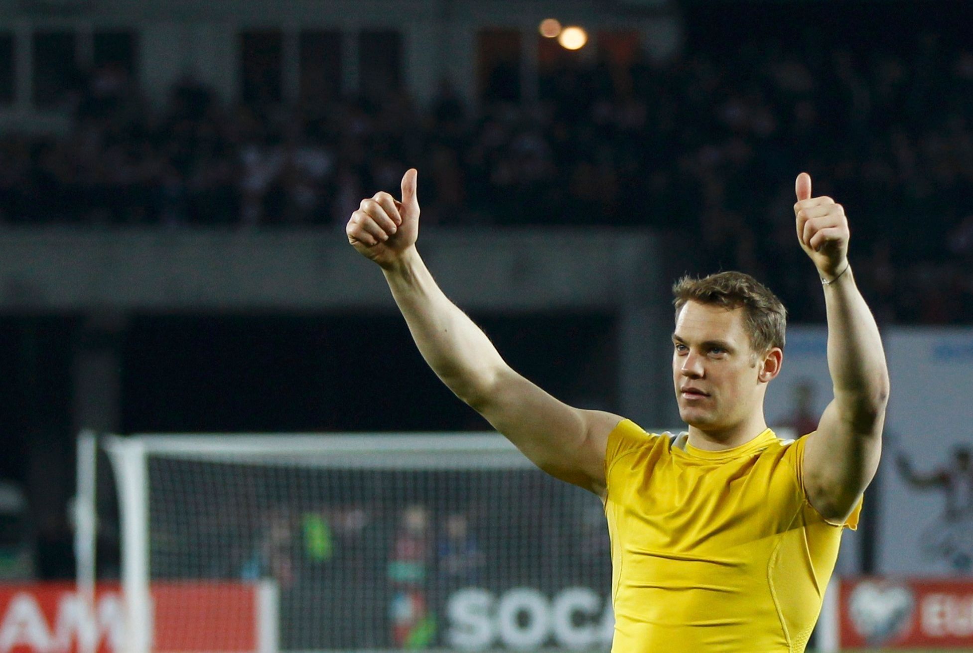 Germany's goalkeeper Neuer gestures after winning their Euro 2016 qualifier soccer match against Georgia in Tbilisi