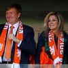 King Willem-Alexander and Queen Maxima of the Netherlands cheer as they watch their 2014 World Cup Group B soccer match against Australia at the Beira Rio stadium in Porto Alegre