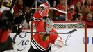 Chicago Blackhawks goalie Corey Crawford makes a save against the Boston Bruins in the third period during Game 2 of their NHL Stanley Cup Finals hockey series in Chicago