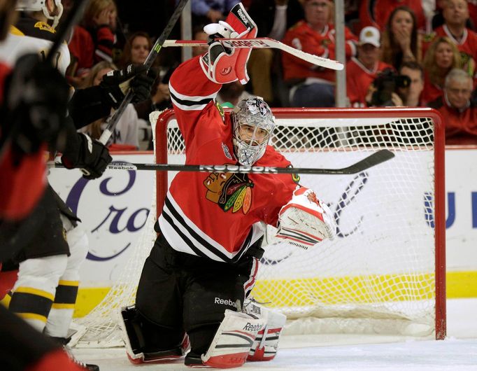 Chicago Blackhawks goalie Corey Crawford makes a save against the Boston Bruins in the third period during Game 2 of their NHL Stanley Cup Finals hockey series in Chicago