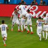 Chile's Charles Aranguiz is congratulated by teammates after his goal during the 2014 World Cup Group B soccer match between Spain and Chile at the Maracana stadium