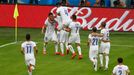 Chile's Charles Aranguiz (20) is congratulated by teammates after his goal during the 2014 World Cup Group B soccer match between Spain and Chile at the Maracana stadium