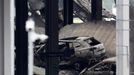 A view shows burnt vehicles in Terminal Car Park 2, following a fire at London Luton Airport, in Luton, Britain, October 11, 2023.  REUTERS/Peter Cziborra