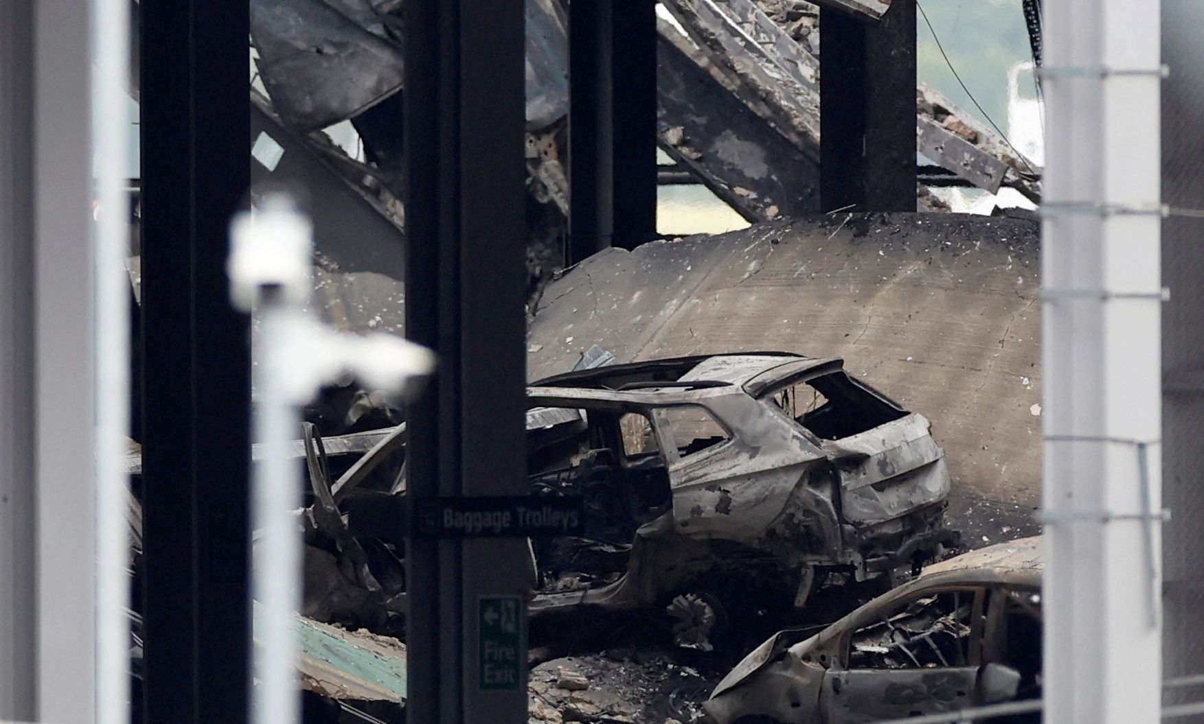 A view shows burnt vehicles in Terminal Car Park 2, following a fire at ...