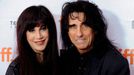 Alice Cooper (R) and wife Sheryl Goddard pose on the red carpet before a screening of the film Supermensch The Legend of Shep Gordon