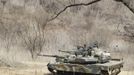 South Korean soldiers from an artillery unit participate in a military drill near the demilitarised zone separating North Korea from the South, in Paju, north of Seoul March 29, 2013. North Korea put its missile units on standby on Friday to attack U.S. military bases in South Korea and the Pacific, after the United States flew two nuclear-capable stealth bombers over the Korean peninsula in a rare show of force. North Korean leader Kim Jong-un signed off on the order at a midnight meeting of top generals and "judged the time has come to settle accounts with the U.S. imperialists in view of the prevailing situation", the official KCNA news agency said. REUTERS/Lee Jae-Won