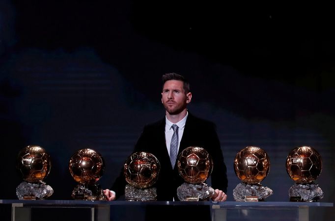 Soccer Football - The Ballon d’Or awards - Theatre du Chatelet, Paris, France - December 2, 2019  Barcelona's Lionel Messi with his six Ballon d'Or trophies   REUTERS/Chr