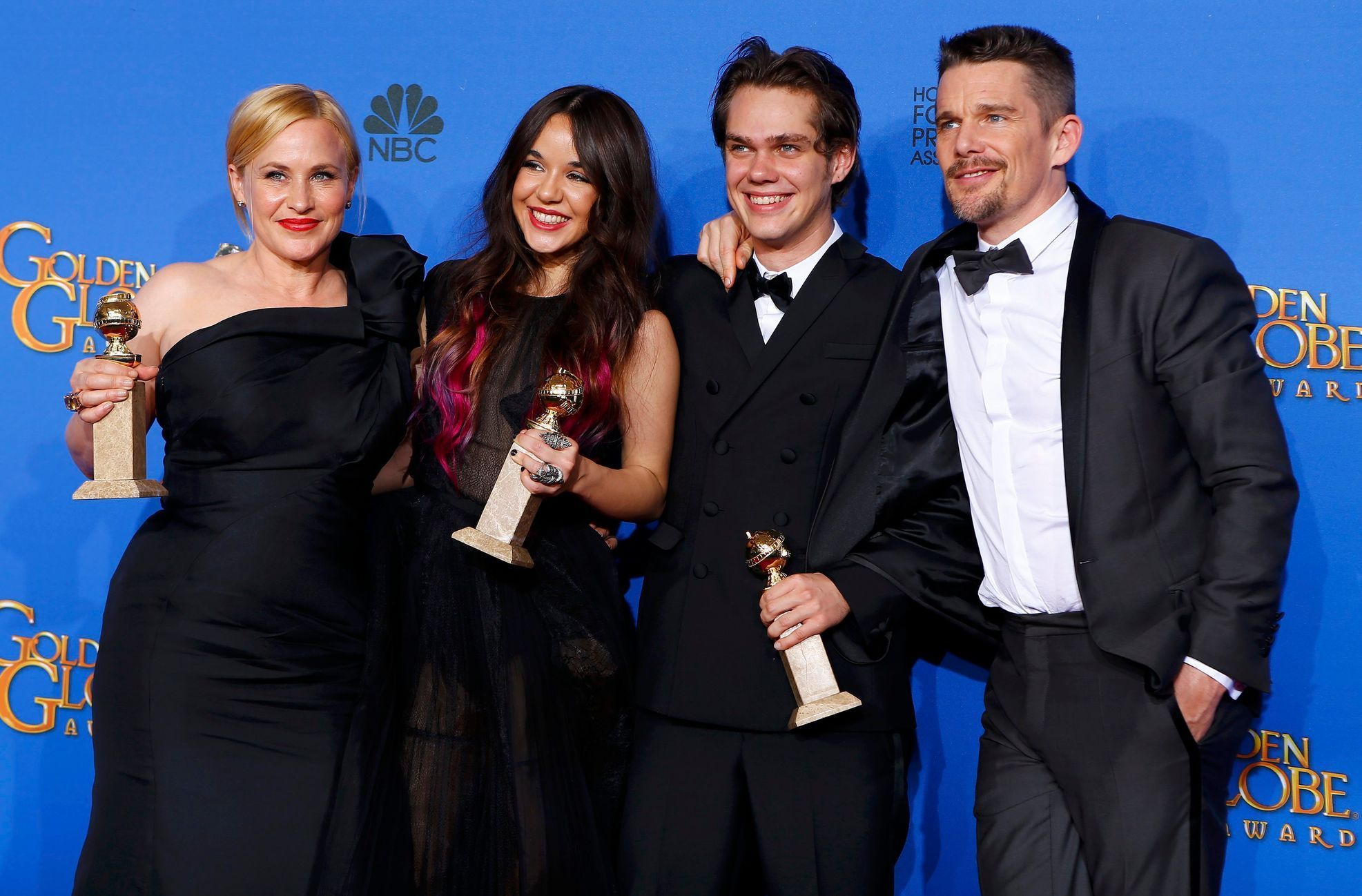 The cast of &quot;Boyhood&quot; poses with their award during the 72nd Golden Globe Awards in Beverly Hills