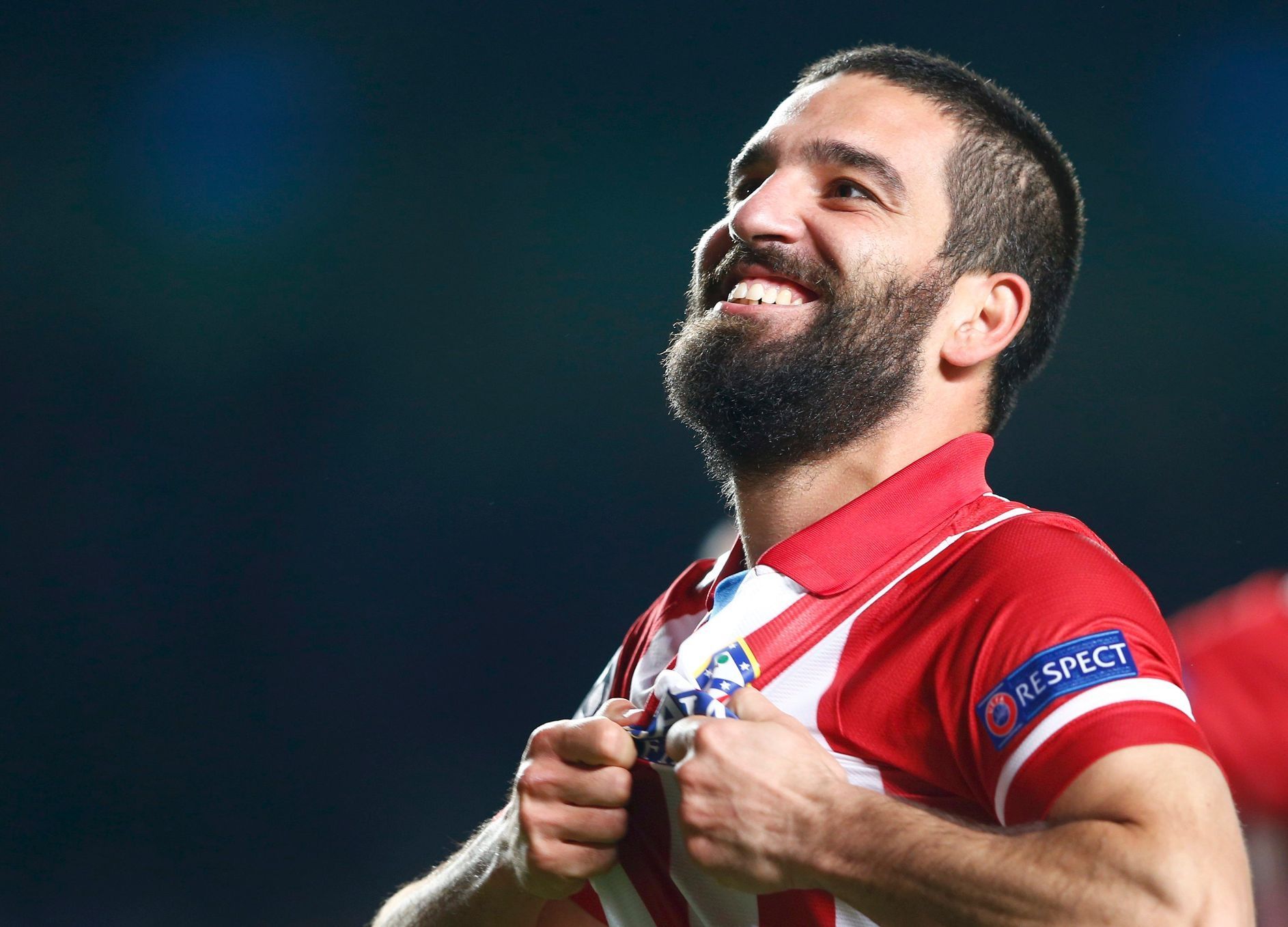 Atletico's Turan reacts at the end of their Champions League semi-final second leg soccer match at Stamford Bridge against Chelsea in London