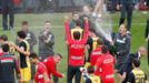 Atletico Madrid's team members celebrate, spraying champagne, after winning their Spanish First Division soccer match against Barcelona, and the league title, in Barcelon