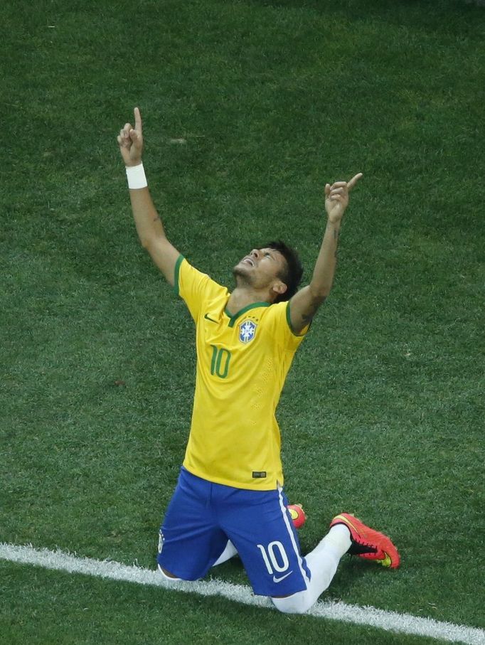 Brazil's Neymar celebrates after scoring a goal from a penalty kick during the 2014 World Cup opening match against Croatia at the Corinthians arena in Sao Paulo June 12,