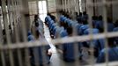 Inmates sit on the floor during an inspection visit in the long term sentence zone inside Klong Prem high-security prison in Bangkok, Thailand July 12, 2016.