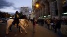 A soccer fan has his photo taken with mounted Spanish National Police officers as they queue to enter the Santiago Bernabeu stadium before the &quot;Clasico&quot; soccer