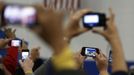 Cell phone cameras catch U.S. President Barack Obama as he delivers remarks at a campaign event at Springfield High School in Ohio, November 2, 2012. REUTERS/Larry Downing (UNITED STATES - Tags: POLITICS ELECTIONS USA PRESIDENTIAL ELECTION) Published: Lis. 2, 2012, 5:40 odp.