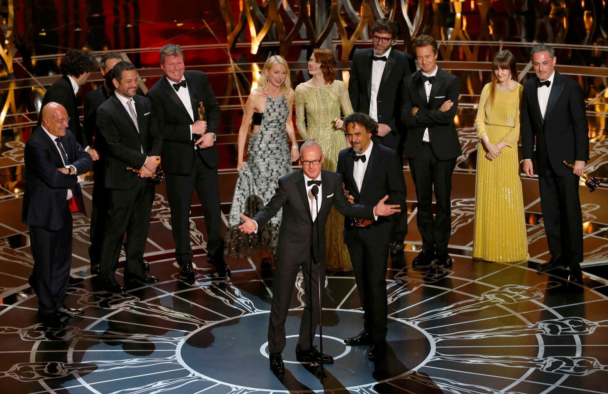 Actor Keaton and director Inarritu accept the Oscar for best picture for his film &quot;Birdman&quot;during the 87th Academy Awards in Hollywood