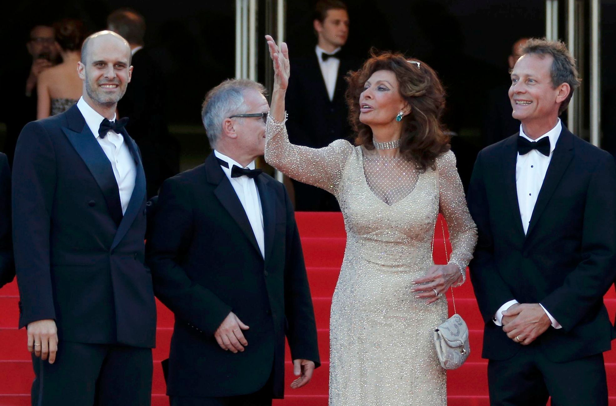 Actress Sophia Loren poses on the red carpet as she arrives for the screening of the film &quot;Deux jours, une nuit&quot; at the 67th Cannes Film Festival in Cannes