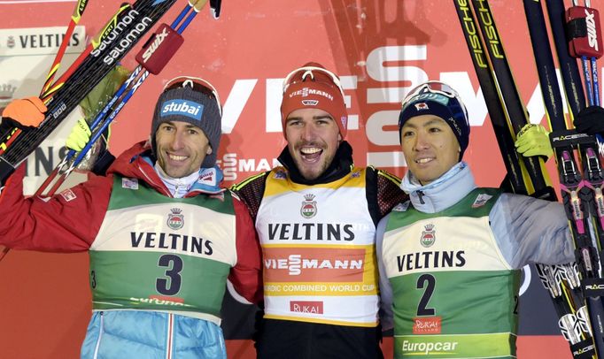 Second-placed Wilhelm Denifl of Austria, winner Johannes Rydzek of Germany and third-placed Akito Watabe of Japan