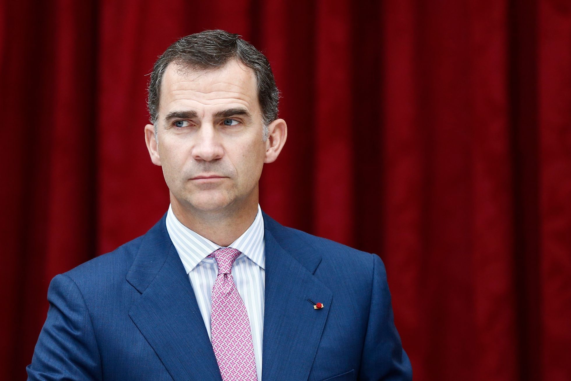 Spain's King Felipe VI attends a lunch with French President Francois Hollande at the Elysee Palace in Paris