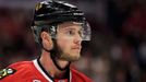 Chicago Blackhawks center Jonathan Toews (19) looks out from his helmet against the Boston Bruins during Game 1 of their NHL Stanley Cup Finals hockey series in Chicago,