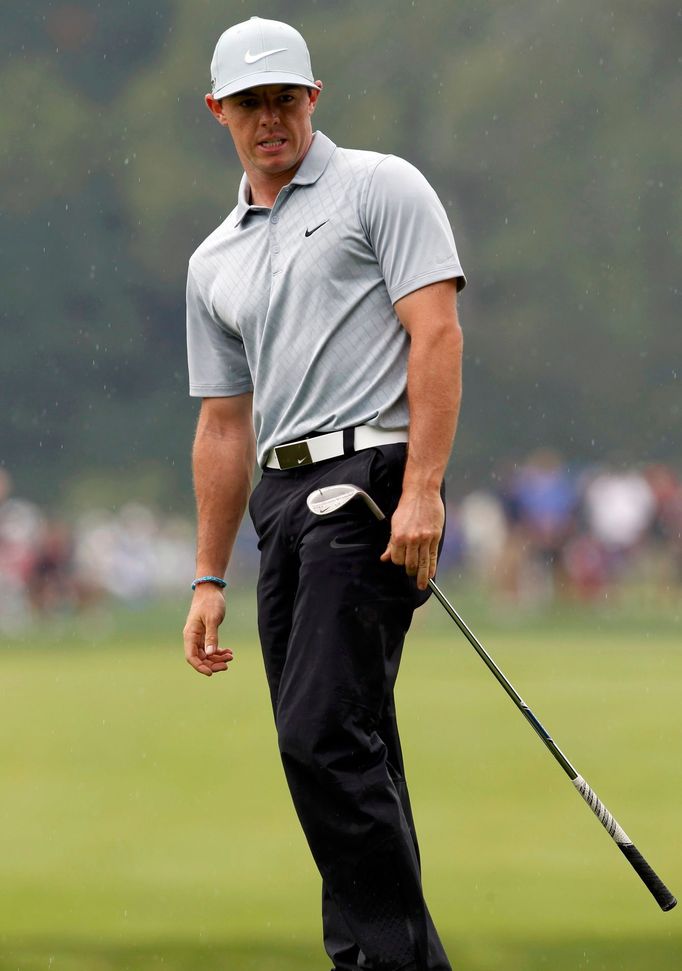 Rory McIlroy of Northern Ireland looks over his chip shot on the fourth hole during the second round of the PGA Championship at Valhalla Golf Club in Louisville