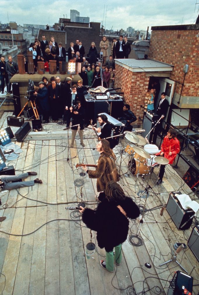 The Beatles při koncertu na střeše budovy Apple Corps, 30. ledna 1969.