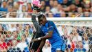 Portugal's Pepe and Rui Patricio in action with France's Paul Pogba