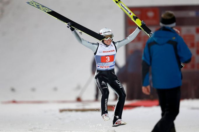 Switzerland's Ammann celebrates after winning the first jumping of the 62nd four-hills ski jumping tournament in Oberstdorf