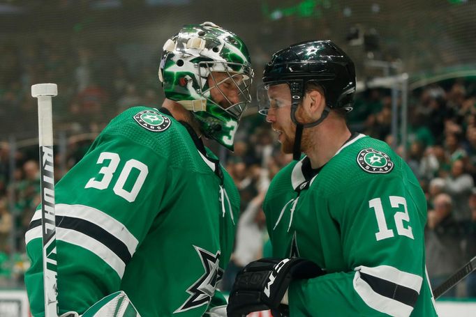 Nov 2, 2019; Dallas, TX, USA; Dallas Stars goaltender Ben Bishop (30) and center Radek Faksa (12) celebrate a goal in the third period against the Montreal Canadiens at A