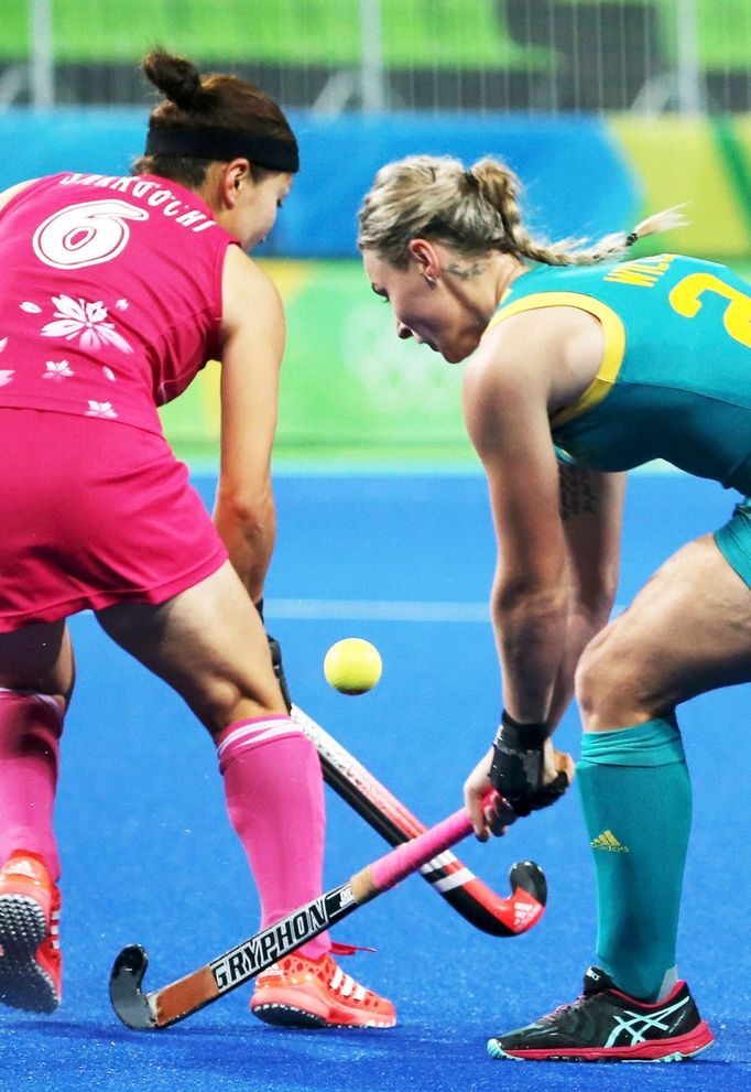 Women's Pool B Australia v Japan - Olympic Hockey Centre - Rio de Janeiro, Brazil - 13/08/2016. Mariah Williams (AUS) of Australia (R) competes with Maki Sakaguchi (JPN)