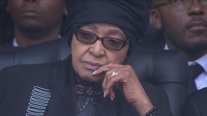 Winnie Mandela, ex-wife of former South African President Nelson Mandela, is seen in this still image taken from video courtesy of the South Africa Broadcasting Corporation (SABC) at the First National Bank (FNB) Stadium, also known as Soccer City, during Nelson Mandela's national memorial service in Johannesburg December 10, 2013.