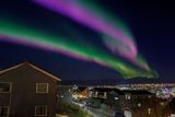 Polární záře ve městě Tromsø na severu Norska.