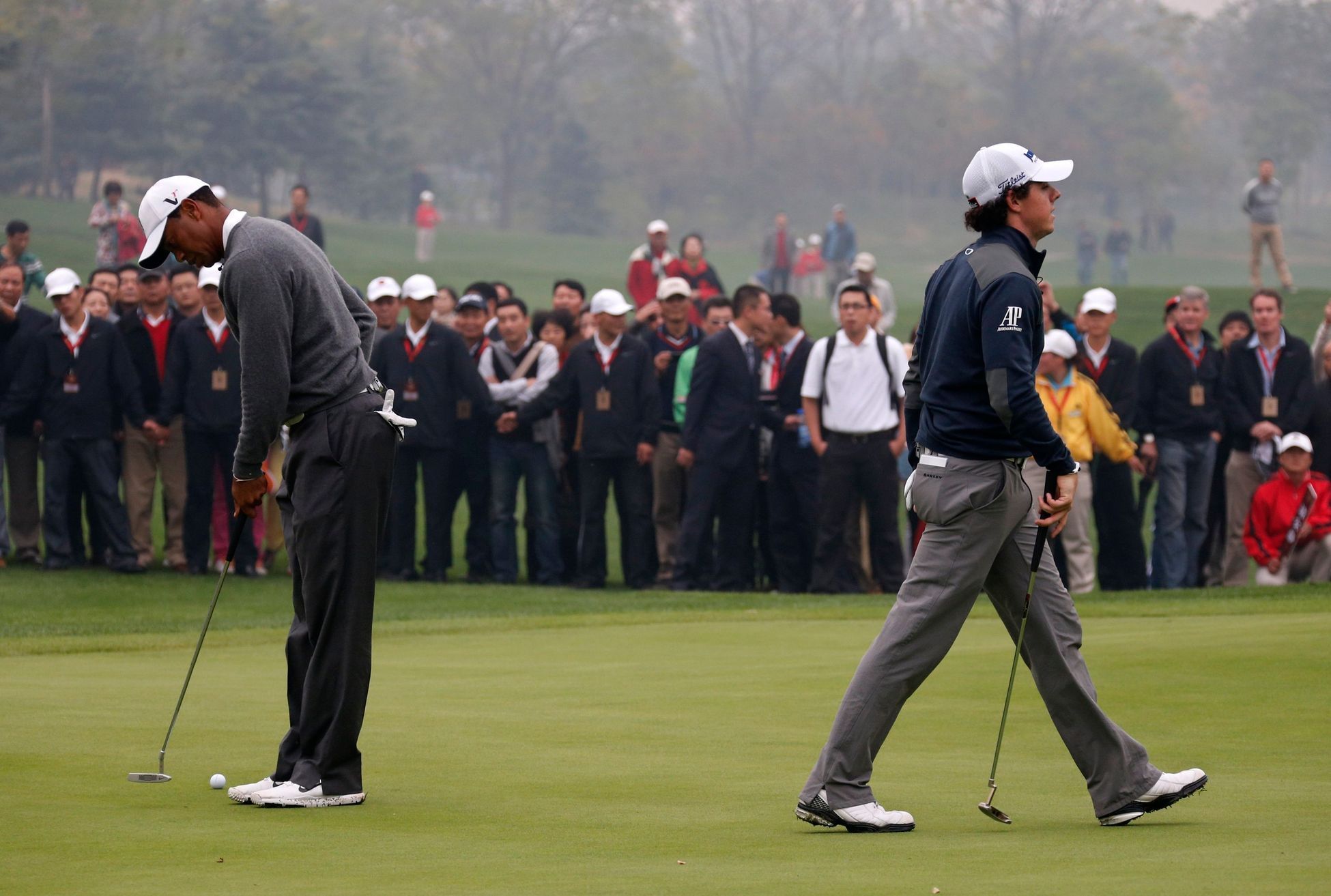 Čínská exhibice mezi Rorym McIlroyem a Tigerem Woodsem