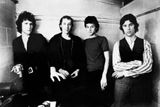 Zakládající sestava Dire Straits v roce 1979. Zleva basista John Illsley, Mark Knopfler, jeho mladší bratr a druhý kytarista David Knopfler a bubeník Pick Withers.