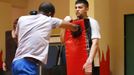 Unemployed Belgian Mohamed Sammar (C) takes part in a "Fit for a job" boxing class in Brussels July 1, 2013. Sammar, 27, has been looking for a job in the construction sector for 2 years. "Fit for a job" is the initiative of former Belgian boxing champion Bea Diallo, whose goal was to restore the confidence of unemployed people and help them find a job through their participation in sports. Picture taken July 1, 2013. REUTERS/Francois Lenoir (BELGIUM - Tags: SPORT BOXING SOCIETY BUSINESS EMPLOYMENT) Published: Čec. 5, 2013, 4:33 odp.